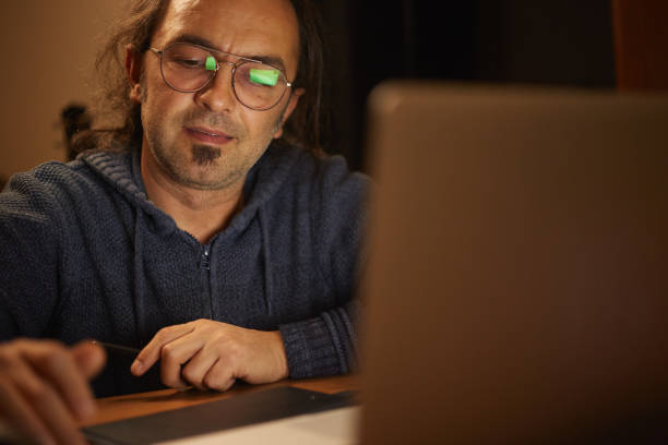 istock A man is working on laptop on home office desk 1348294570