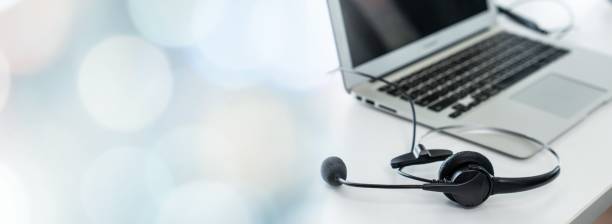 istock Headset and customer support equipment at call center ready for actively service 1348296244
