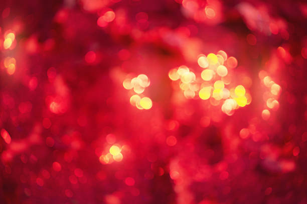 istock Red orange yellow soft defocus light as a texture for designers. Glitter defocus. 1348297971