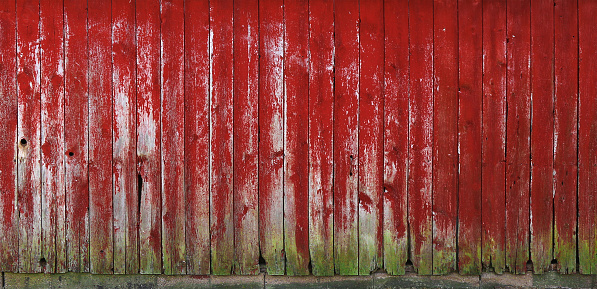 old retro faded painted peeling wood board wall siding building farm structure architectural background