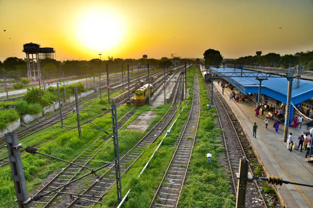 istock Sunrise at a railway station in India 1348312015
