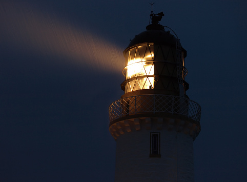 The lighthouse at Mull of Galloway, Scotland, on a rainy night