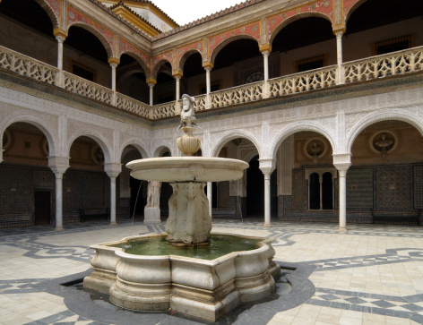 The main courtyard of the Casa de Pilatos in Seville, Spain.