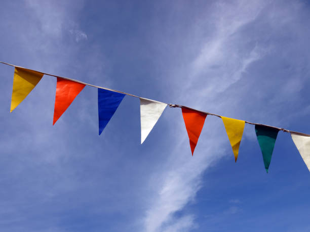 istock Row of coloured flags against the sky 134831611