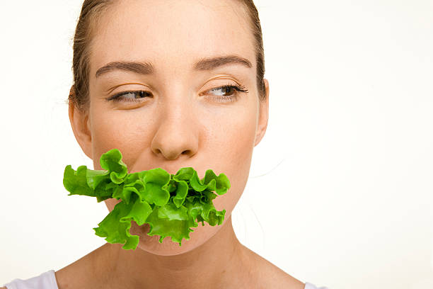 istock Woman with the lettuce 134831662