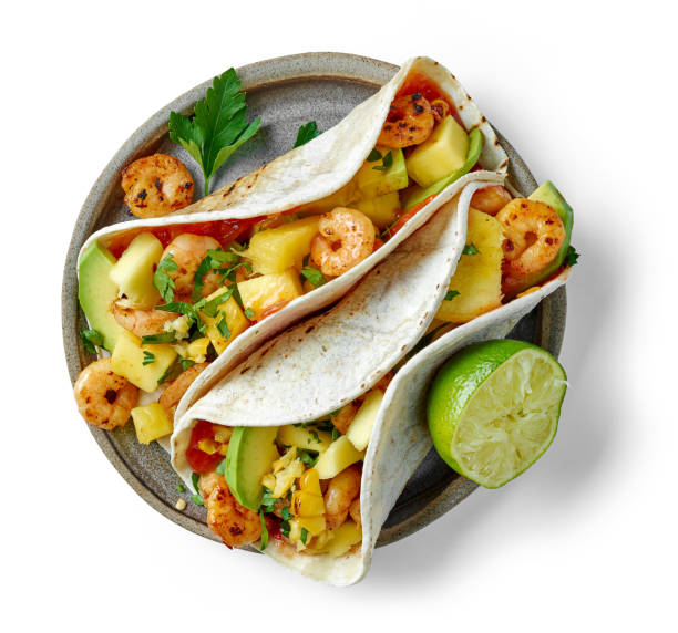 piatto di cibo messicano tacos - prepared shrimp seafood sauces herb foto e immagini stock