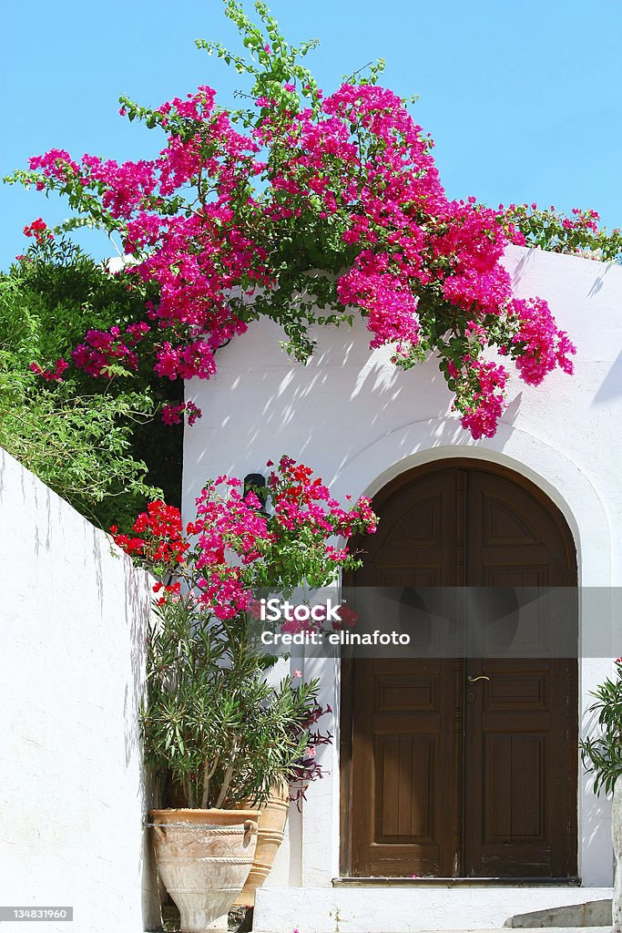 Door in Lindos - island Rhodes, Greece Door in Lindos - island Rhodes, Greece. Lindos Stock Photo