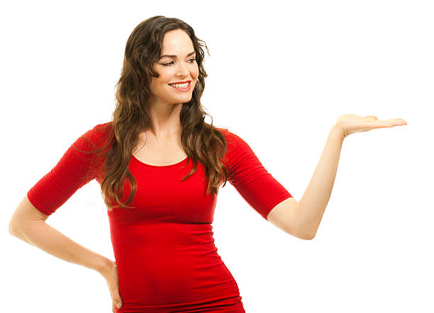 istock Beautiful young woman smiling showing with hand 134832266
