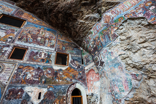 Istanbul,Turkey-October 15,2021:Ancient religious paintings at the interior walls of famous Sumela Monastery in Trabzon Turkey.