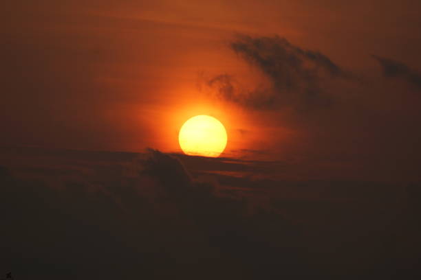 Sunrises in yellow color setting the sky in orange