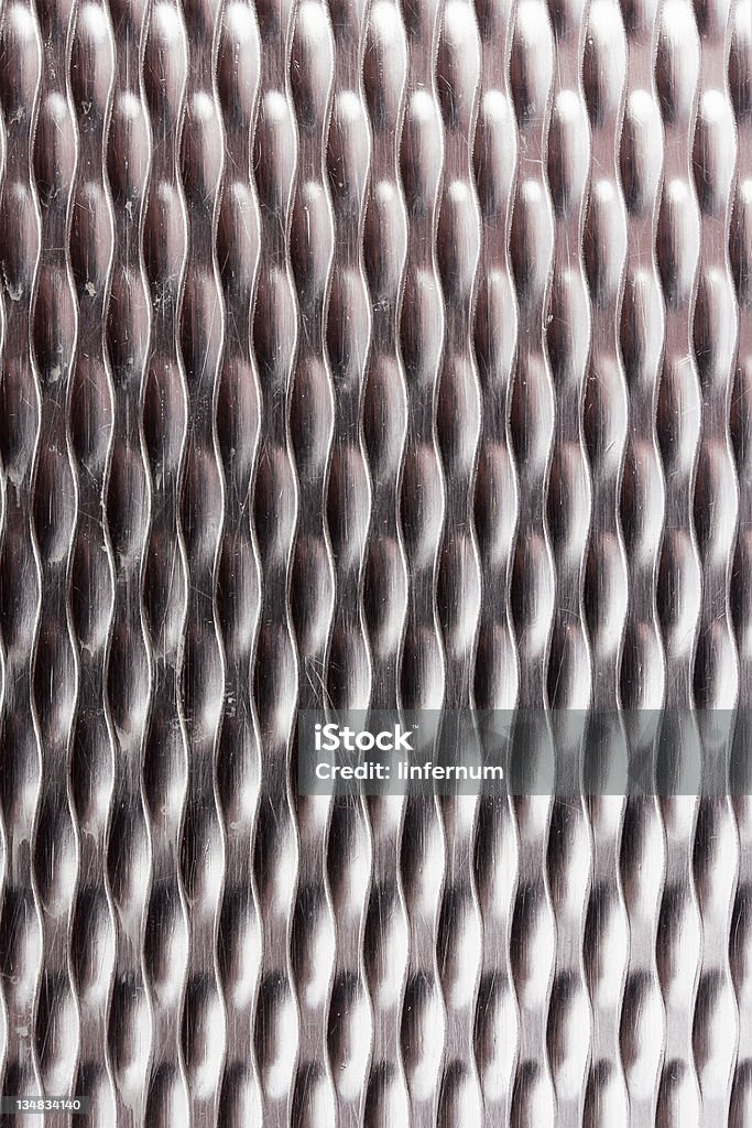 Grey industrial background. Dotted metal plate. Backgrounds Stock Photo