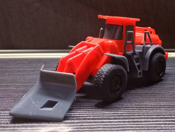 istock Heavy equipment toy car 1348348563
