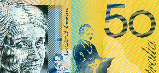 Australian Dollars isolated on whiteClose up on Australian dollar banknotes. Portrait of EDITH COWAN