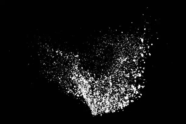 Vector illustration of White splashes isolated on black background.