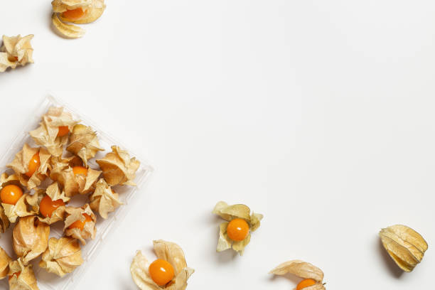 istock Physalis fruit or Physalis peruviana, small golden berries in plastic package Vegetarian and healthy food 1348355358