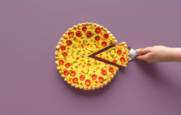 istock Quiche with vegetables top view on a purple table 1348356318
