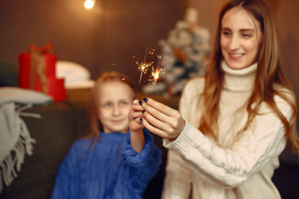 istock Mother with little daughter at home 1348356707