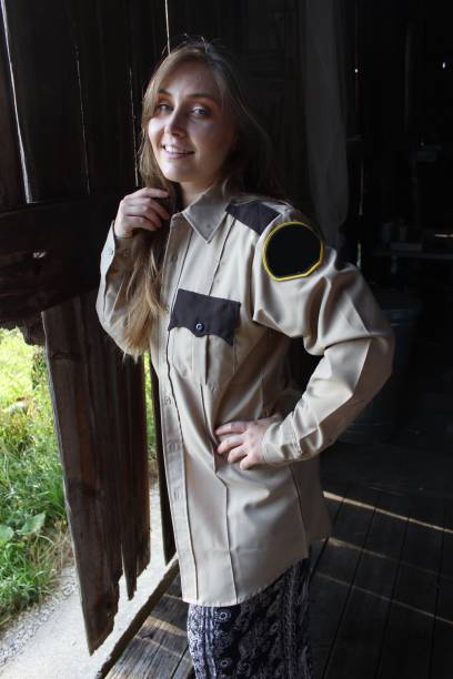 istock girl wearing uniform shirt 1348358312