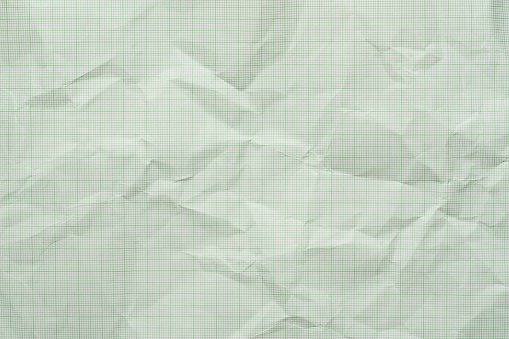 Old crumpled or wrinkled graph paper texture