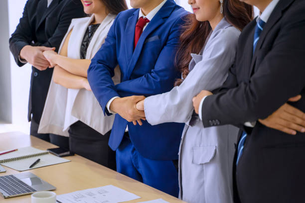 istock White collar workers engagement and meeting. 1348362539
