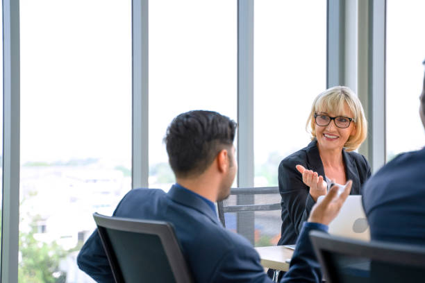 istock White collar workers are working and meeting. 1348363897