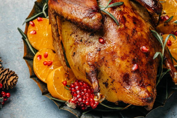 istock Roast duck with oranges for the Holidays. Restaurant menu, dieting, cookbook recipe 1348364921