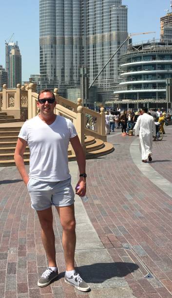 istock Out shopping by the Burj Khalifa. 1348367221