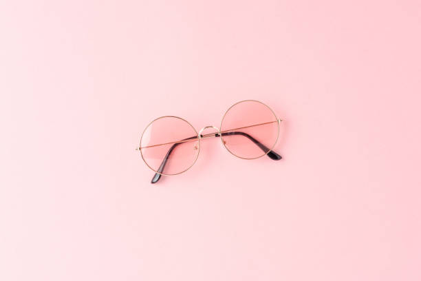 istock Women’s sunglasses on pink background 1348372994