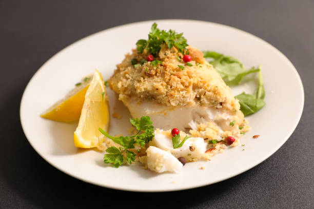 istock fish fillet with crumbs and lemon 1348373079