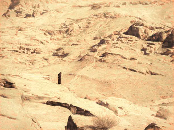Photo of Alone bedouin woman or man in the deserted city of Petra, Jordan.
