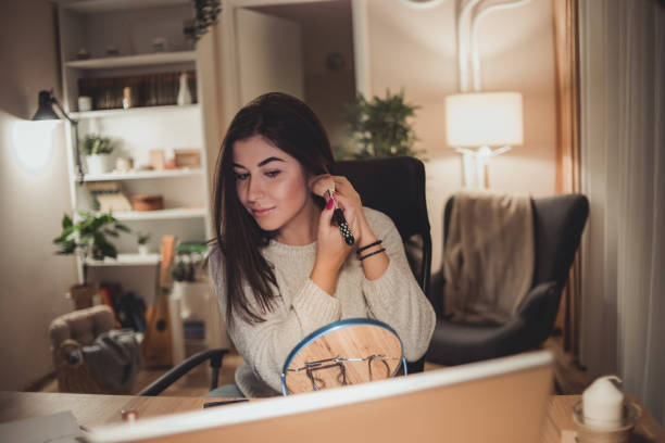 istock A young woman uses a laptop at night 1348376834