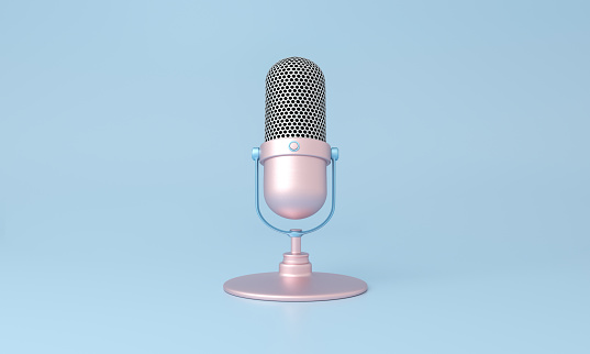 Cute pink microphone isolated on blue minimal style background. 3d rendering.