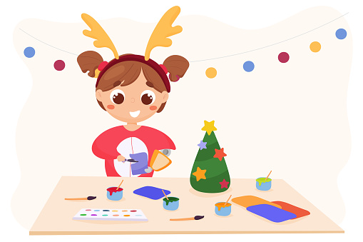 Disabled child doing Christmas craft
