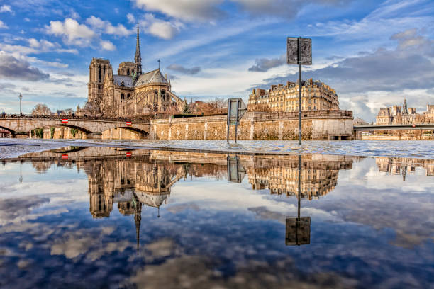 istock Notre Dame de Paris reflected  on the Seine river 1348382311