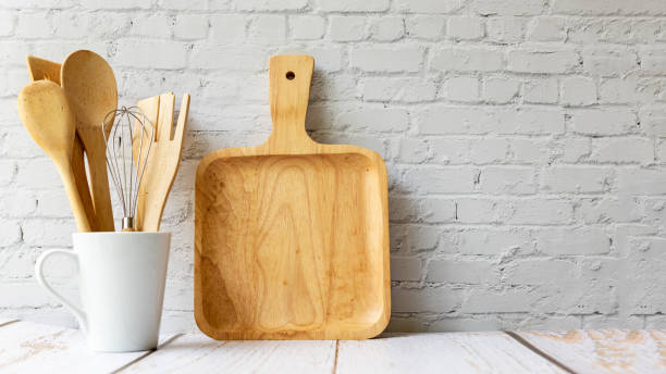 istock Kitchen tools and kitchenware utensil object on kitchen shelf wood white for healthy eat and health care life.  Wall white brick background, copy space for text 1348383719