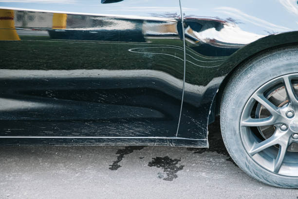 istock close-up mud splashes on black car in natural lighting 1348384960