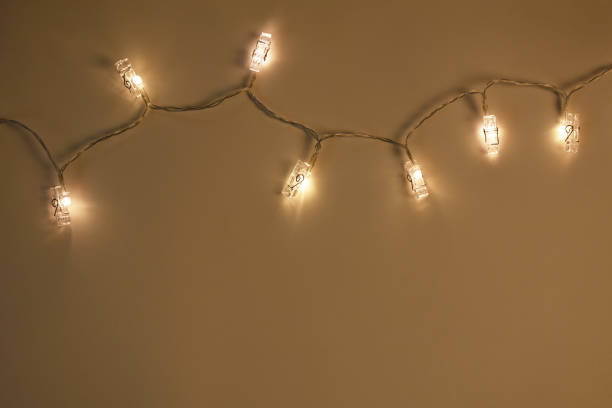 istock Christmas lights on the colored background 1348384963