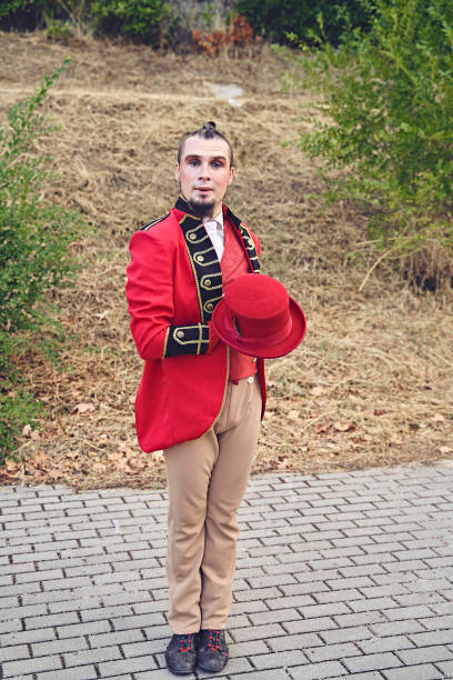 istock Male juggler with hat in park 1348388394