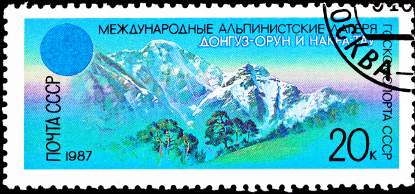 USSR- CIRCA 1987:  A stamp printed in the USSR shows Donguzorun and Nakra-tau mountains in the Caucasus, circa 1987.