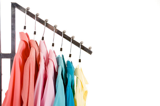 istock Spring shirts hanging on clothes rack in retail store. Pastels. 134840808