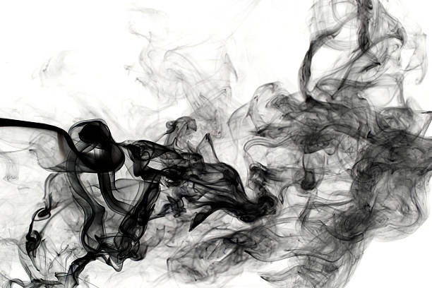Black Smoke Black smoke pouring forth on a white background. wispy stock pictures, royalty-free photos & images