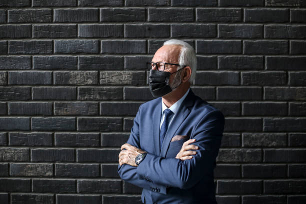 istock Businessman wearing a mask 1348417115