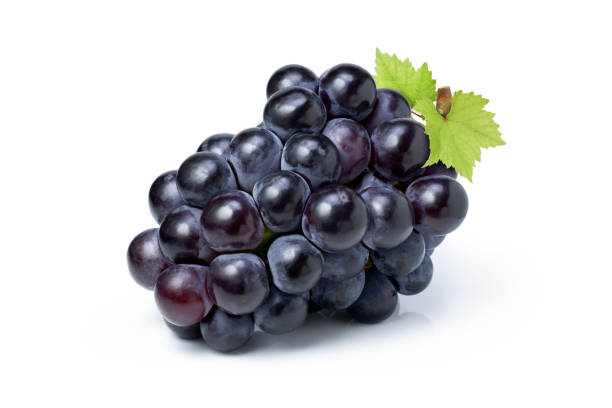 istock Black grapes with green leaf isolated on white background 1348423674