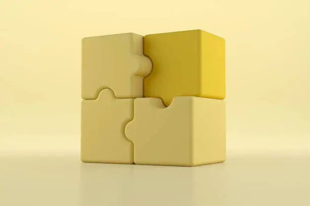 Photo of 3D jigsaw puzzle pieces on yellow background. Problem-solving, business concept. 3d rendering