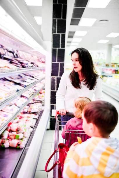 istock Mom and kids shopping 134844497