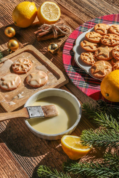 Baking christmas cookies with lemon frosting