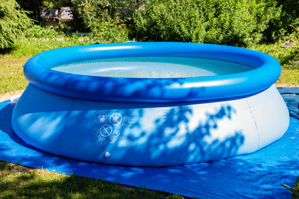 inflatable pool on the lawn - above ground pool imagens e fotografias de stock