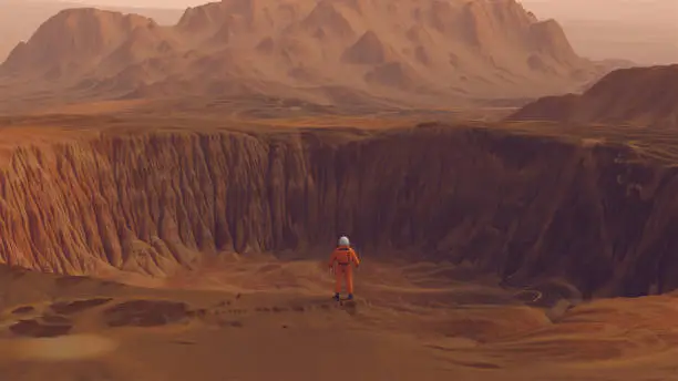 Photo of Astronaut Explorer Large Crater Arid Mountain Extra-Terrestrial Planet Desert Landscape