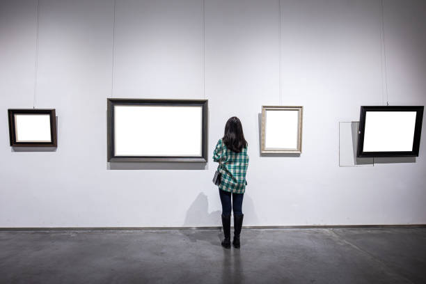 istock Women looking  painting exhibition 1348499341