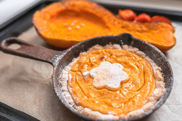 istock Pumpkin pie cooked in an authentic cast iron skillet 1348504485